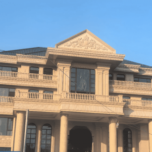 江西黄金麻别墅外墙干挂石材效果示例