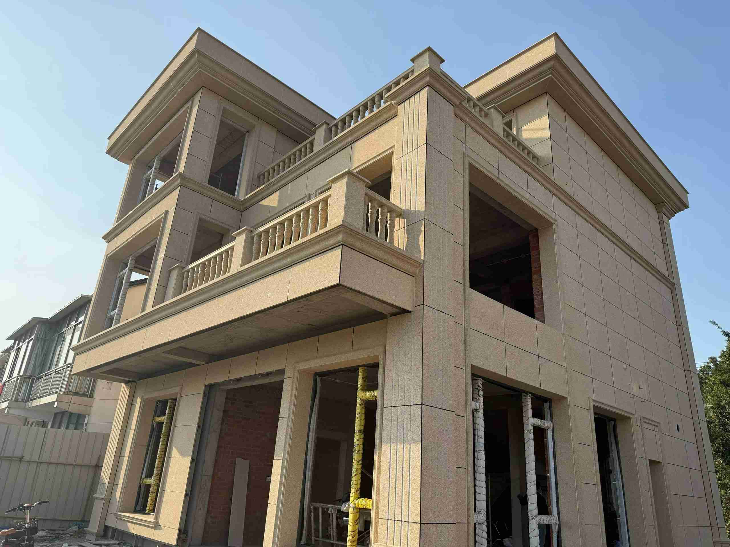 江西 黄金麻花岗岩石材荔枝面外墙干挂效果展示